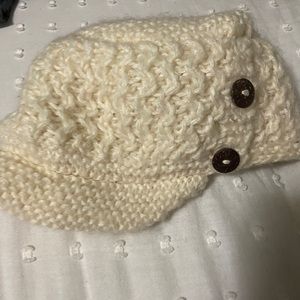 Cream knit hat with buttons